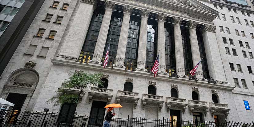Wall Street cruises toward the finish of its best week in 2 months as bank stocks steady
