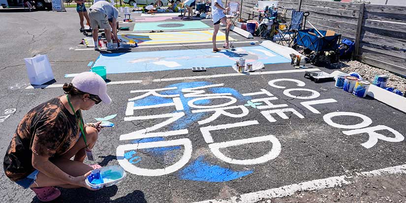 Parking spots used as colorful protest against Florida crackdown on rainbow crosswalks