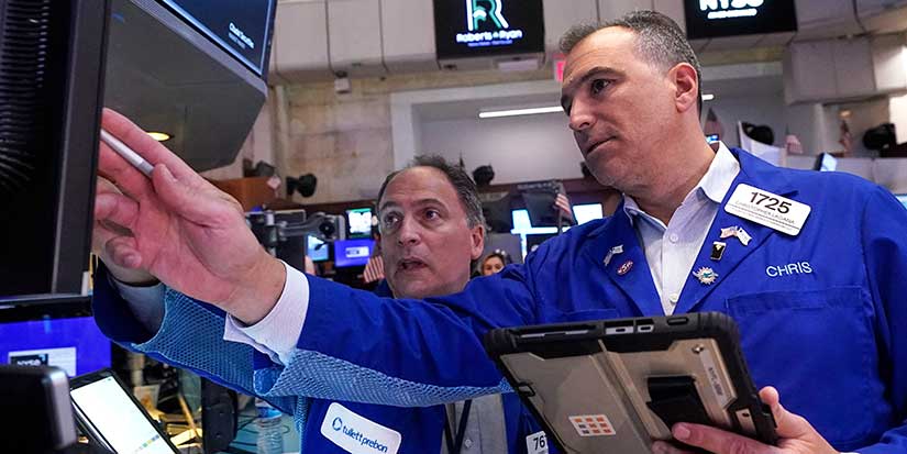 Wall Street drifts as tech stocks climb and oil prices sink