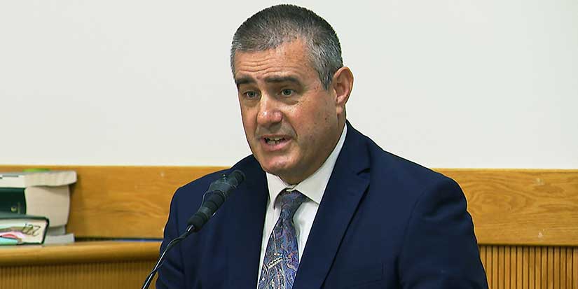 Rhode Island high school coach who did naked fat tests sentenced to year of probation