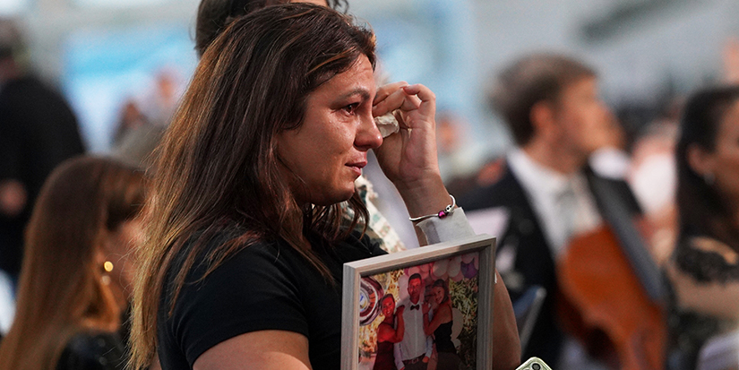 Families of Spain's flood victims voice sorrow and rage at one-year memorial ceremony