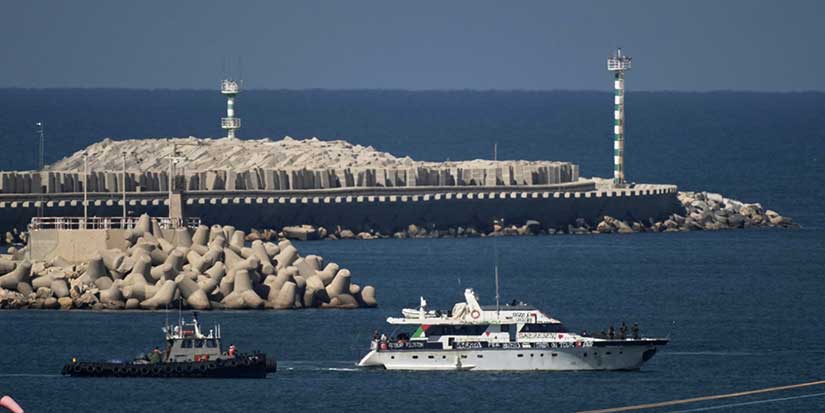 Israel intercepted a Gaza-bound flotilla carrying aid in international waters. Can it do that?