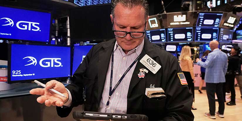 Wall Street holds near records as inflation slows and Oracle soars