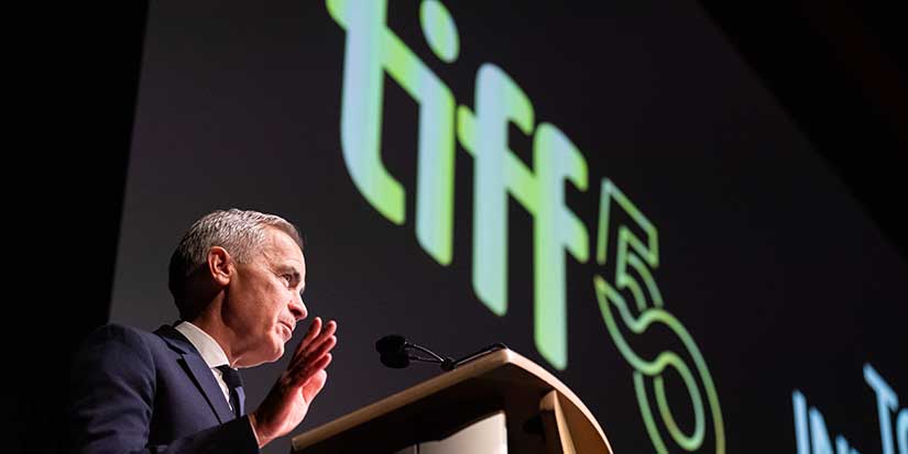 Prime Minister Mark Carney honours John Candy, takes swipe at Trump to open TIFF's 50th edition