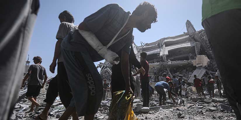 Israel strikes high-rise building and threatens to hit more in Gaza City offensive