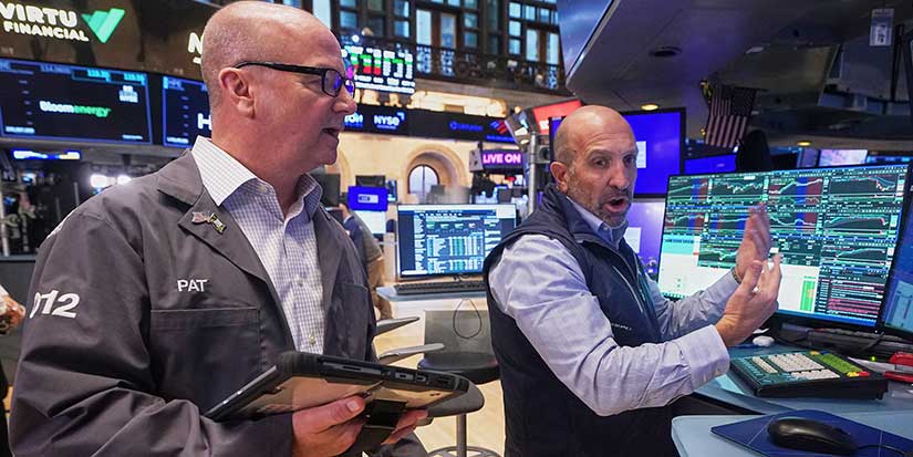 Wall Street falls on big drag from banks amid more turbulent trading