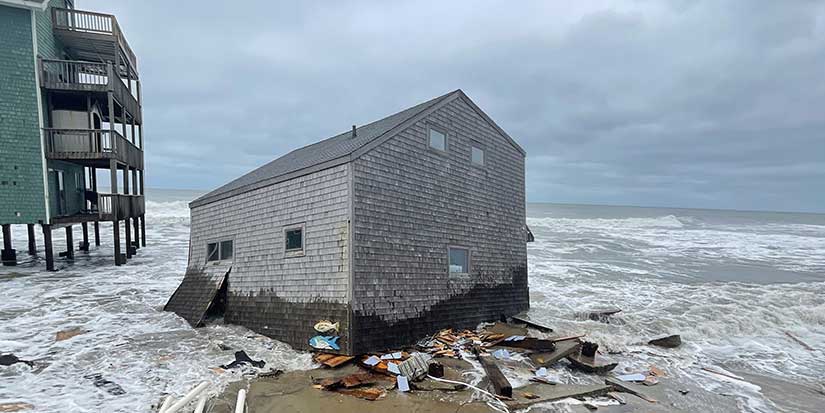 Another beachfront stilt house collapses into the surf on the Outer Banks