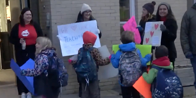 Red shirts and red-rimmed eyes: 740,000 Alberta students back to classes post-strike