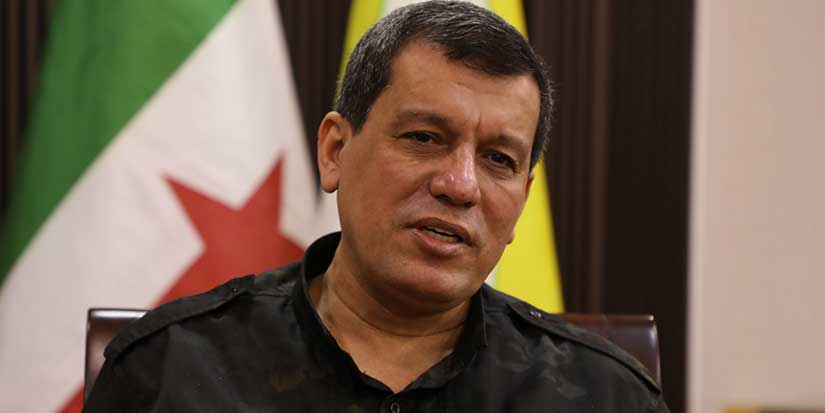 Syrian Kurdish forces reach agreement with Damascus to merge with national army, commander says